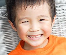 child-smiling-with-teeth